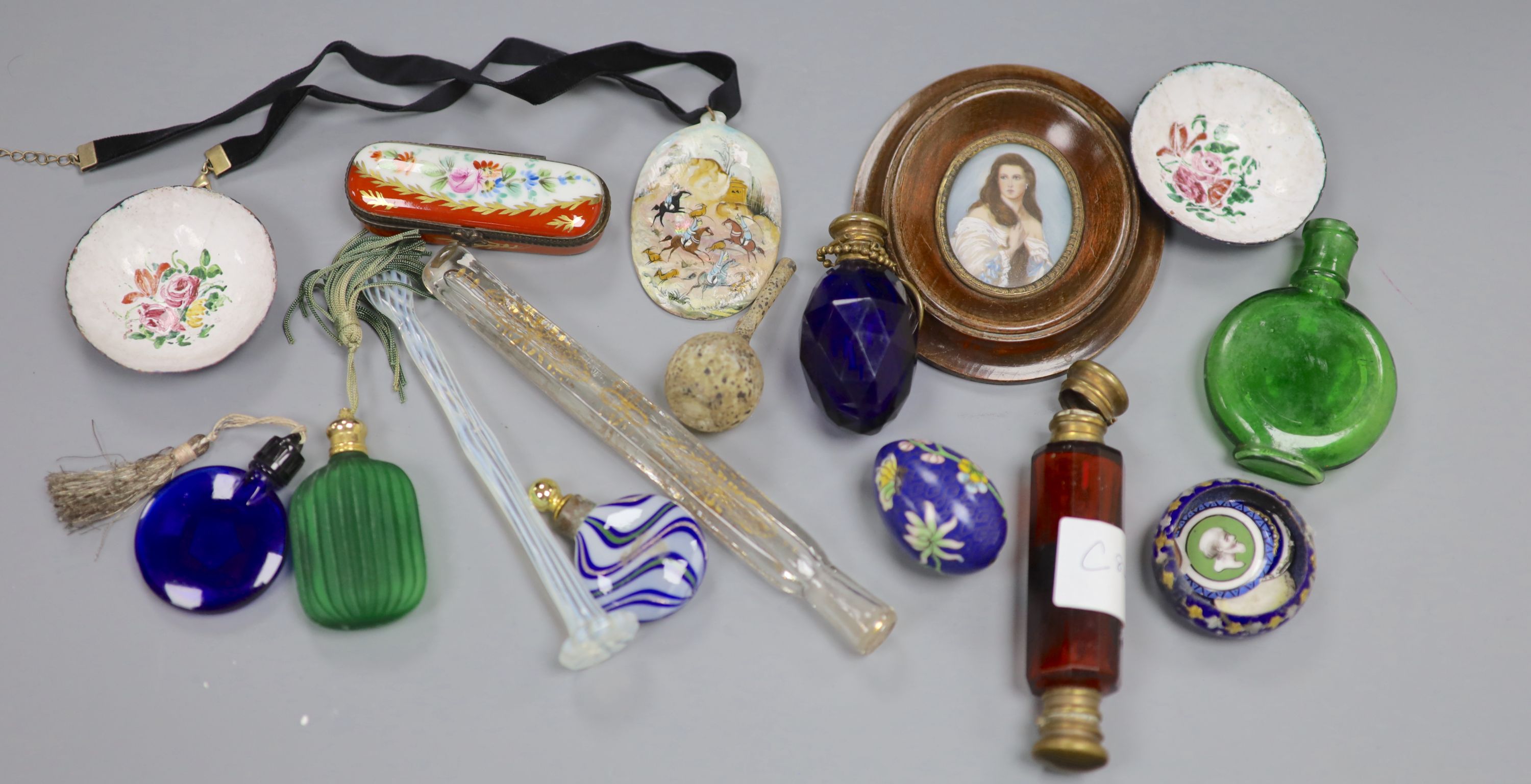 A collection of scent bottles, a miniature antiquity vessel and a miniature of a lady